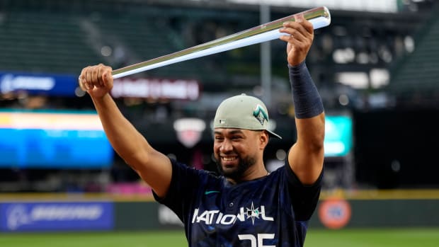 Elias Diaz with the All Star Game MVP trophy